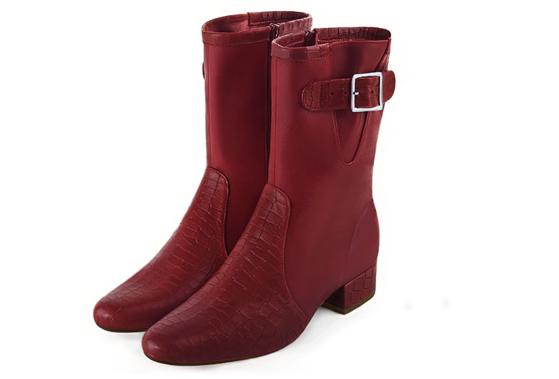 Burgundy red women's ankle boots with buckles on the sides. Round toe. Low block heels. Front view - Florence KOOIJMAN